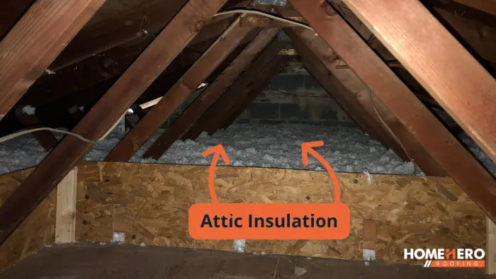 attic insulation installed above flooring
