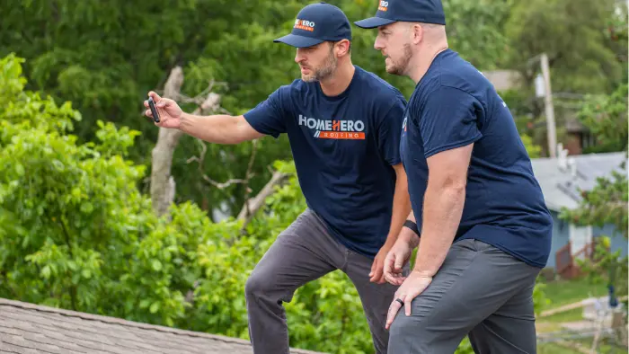 HomeHero Roofing owners on site during a Downers Grove project
