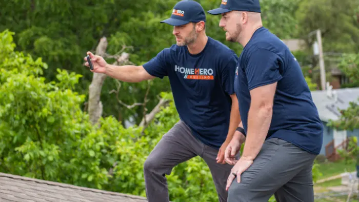 matt and andre inspecting roof in Downers Grove