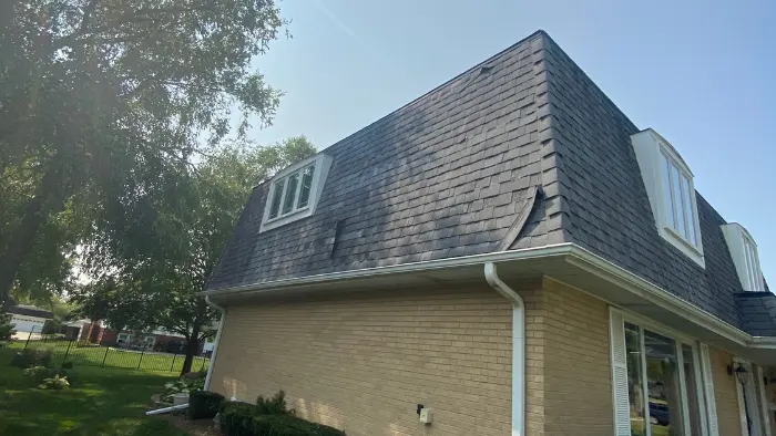 asphalt roof shingles falling off mansard