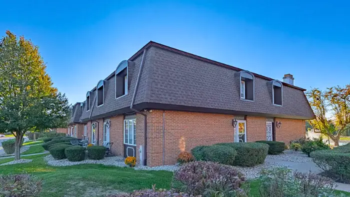 mid century exterior mansard roof shingles