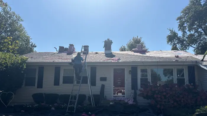 Roof inspection during a roofing project in the Chicago suburbs
