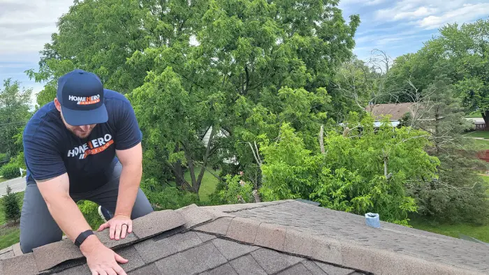 Roofers completing a roof replacement in Downers Grove
