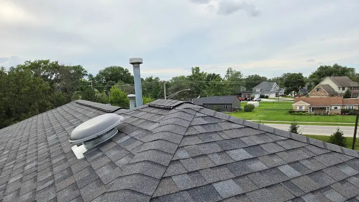 Roofers working on a home in La Grange Highlands
