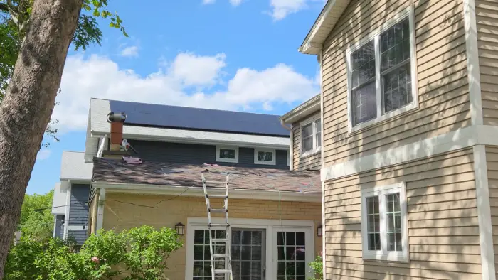 Mae roof replaced solar panels on neighbor's home